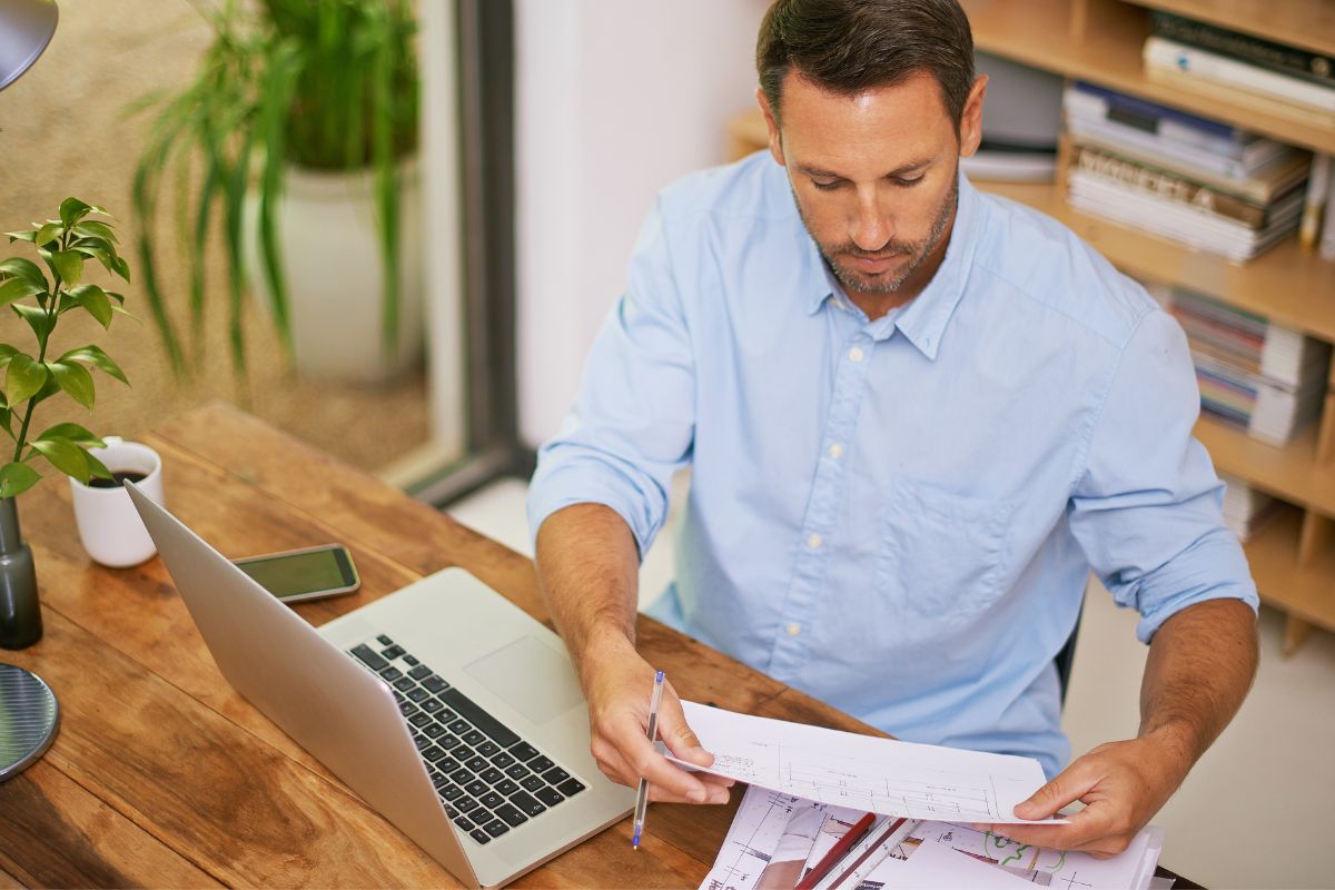 Image of a man bookkeeping.