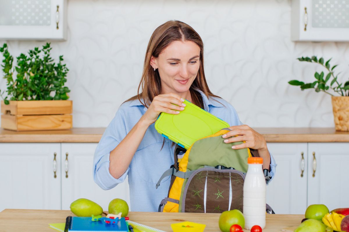 Image of a woman packing her lunch.