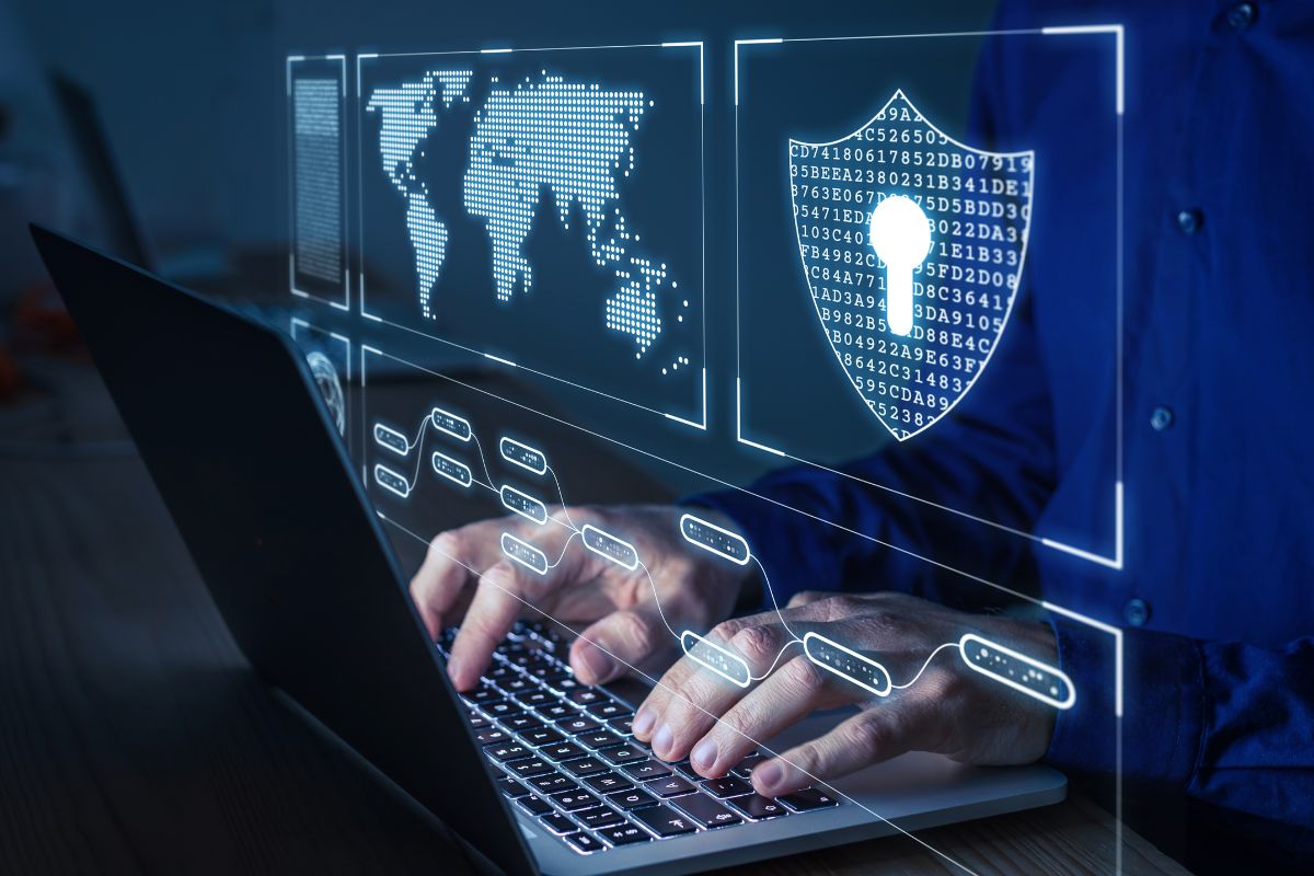 A man's hand working on a cyber security.