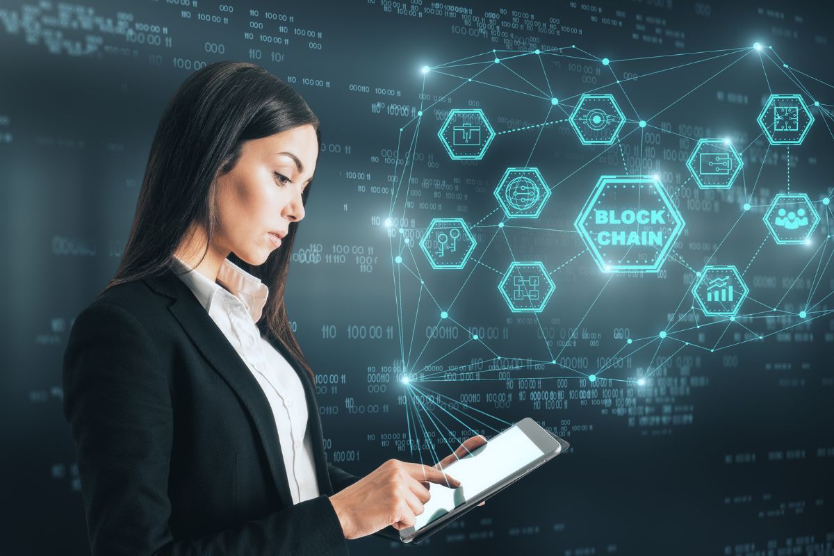 Image of a woman working on a blockchain.
