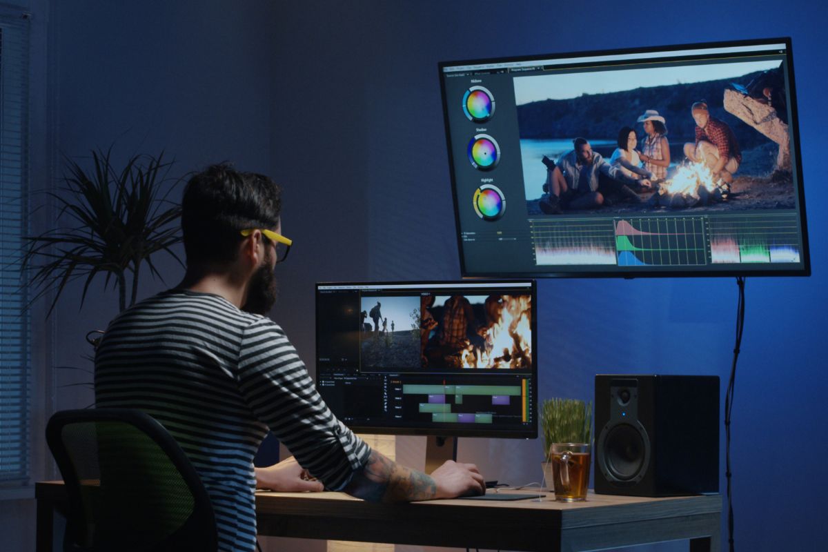 Image of a man editing videos.