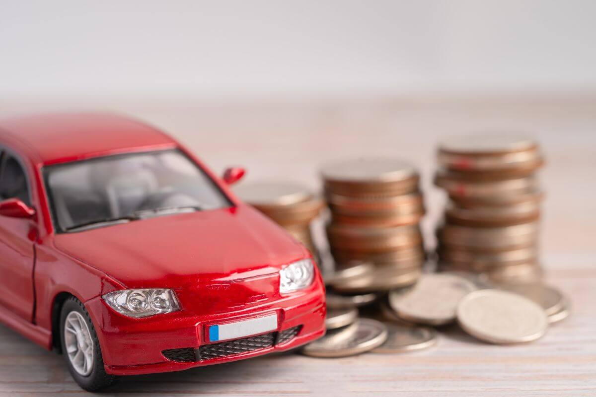 The image tells about the minimalist car and coins referring to new car savings help plan for future vehicle purposes.
