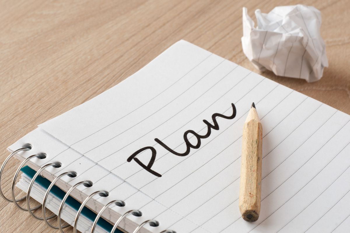 Image of a notebook with plan wording.