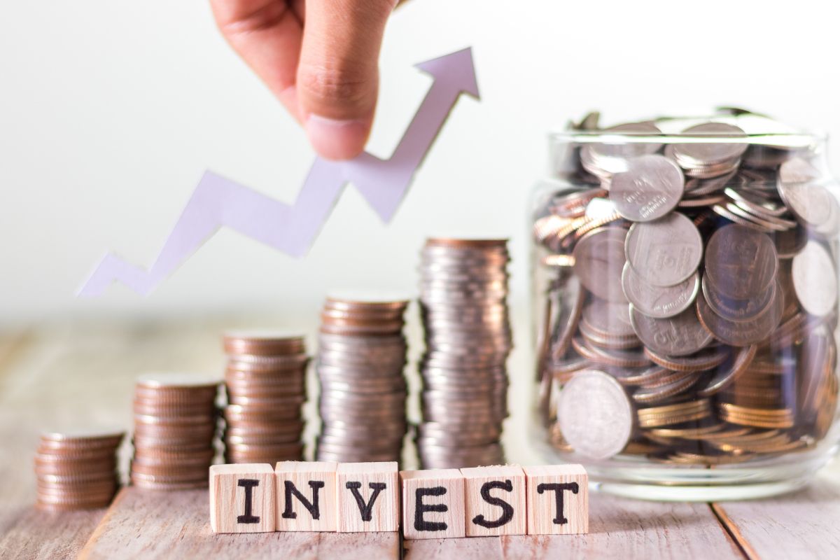 Photo of money and investment wording.