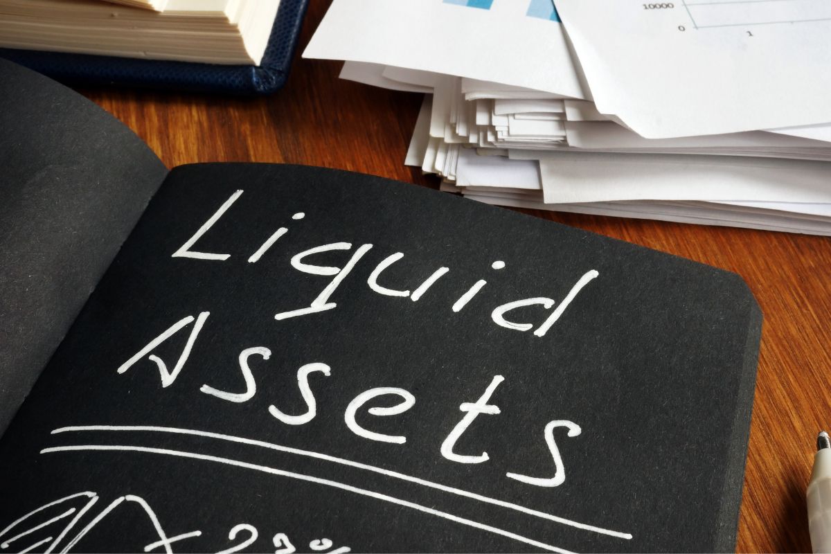 Image of a notebook with liquid assets wording.