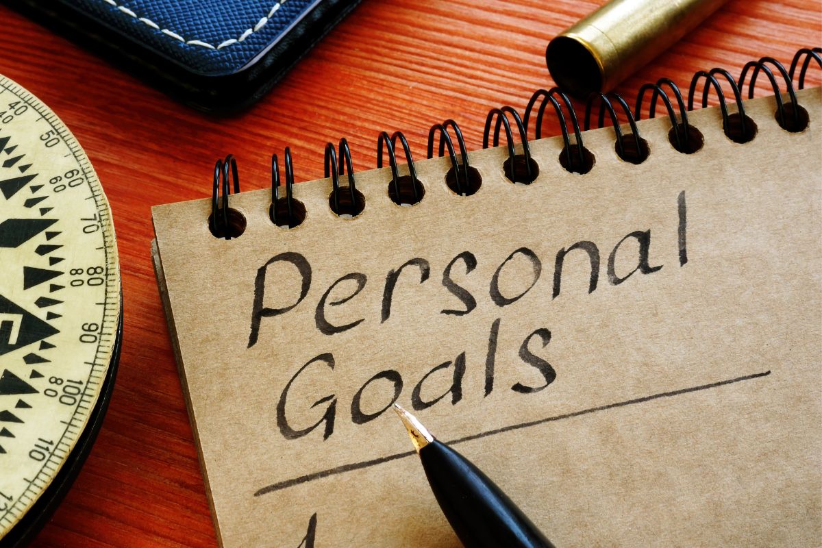 Photo of a notebook with personal goals wording.