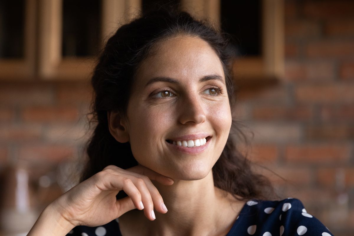 Photo of a woman smiling.