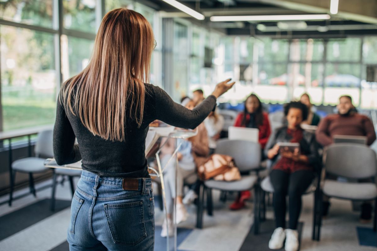 The photo of a woman coaching.