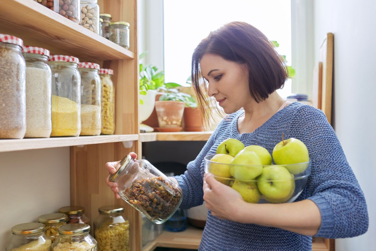 Photo of a woman shopping in her pantry.