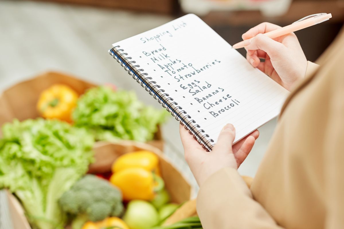 A woman checking her shopping list.