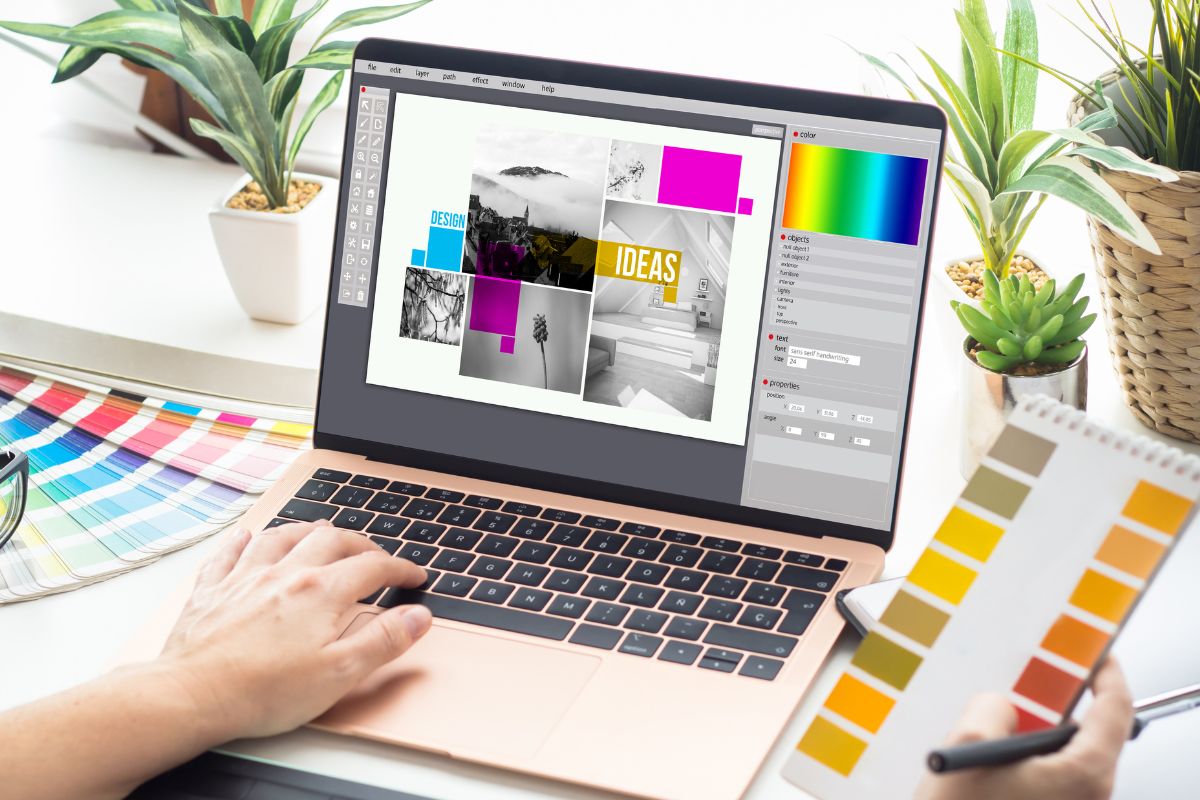 A woman's hand designing a graphic.