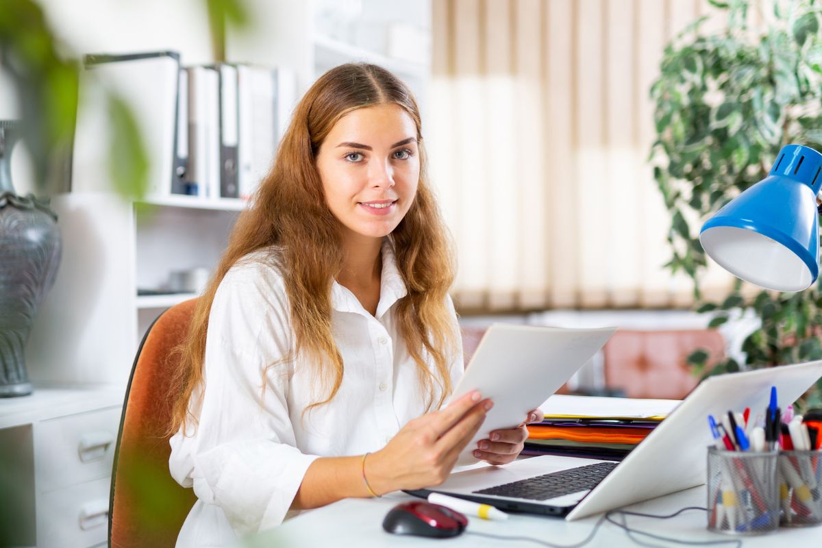 Image of a young woman working in the office.