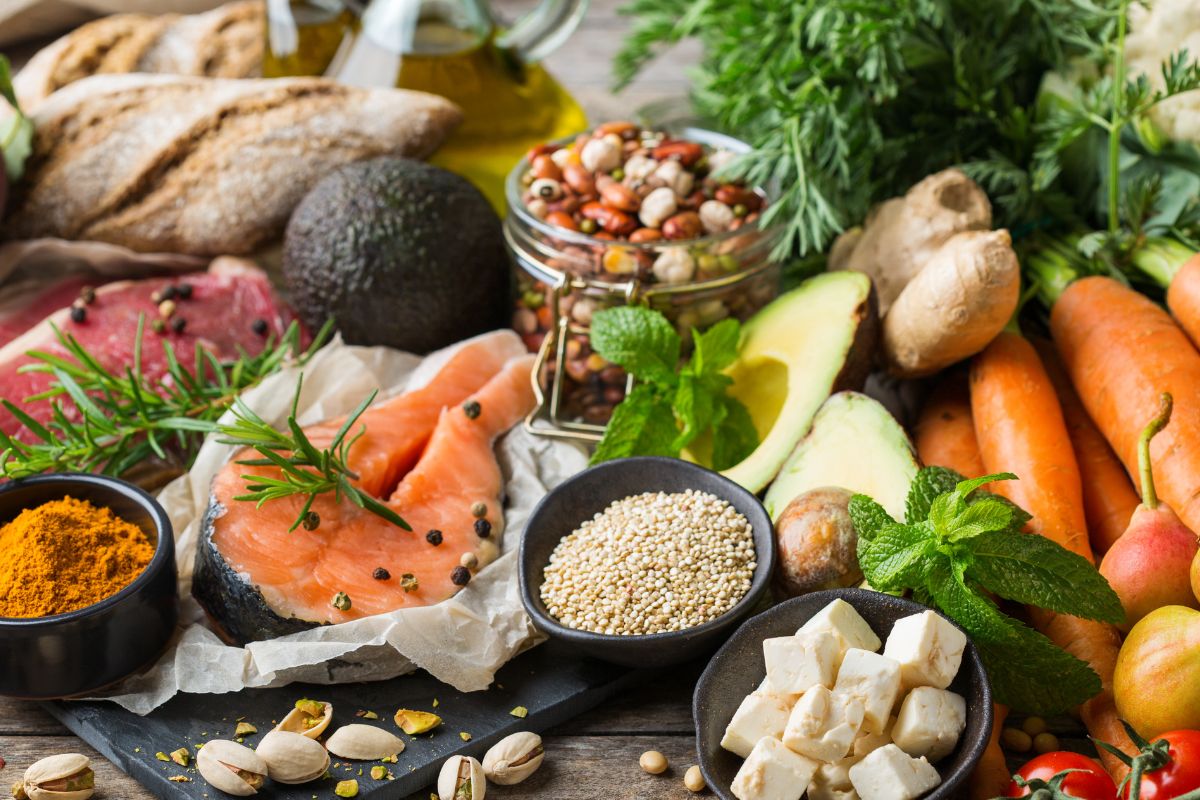 The photo shows vegetables, fruits, and meats.