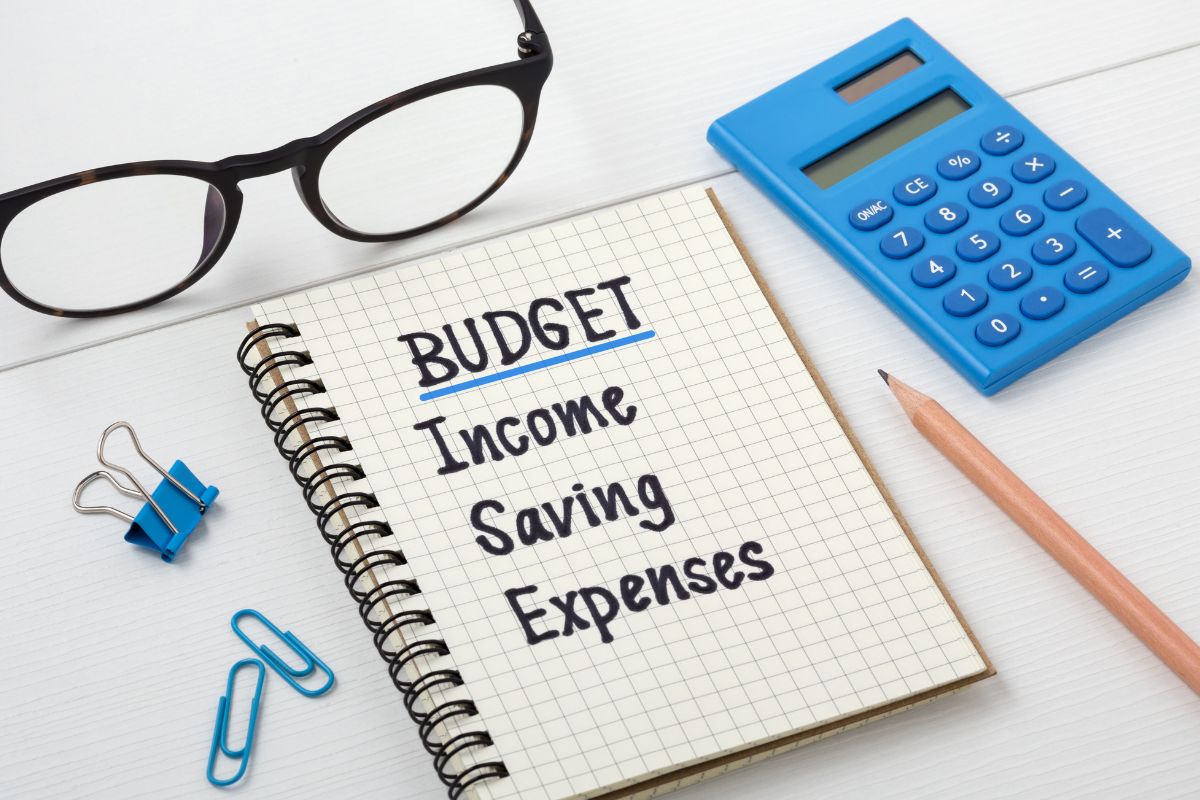 Picture of a notebook with budget categories.