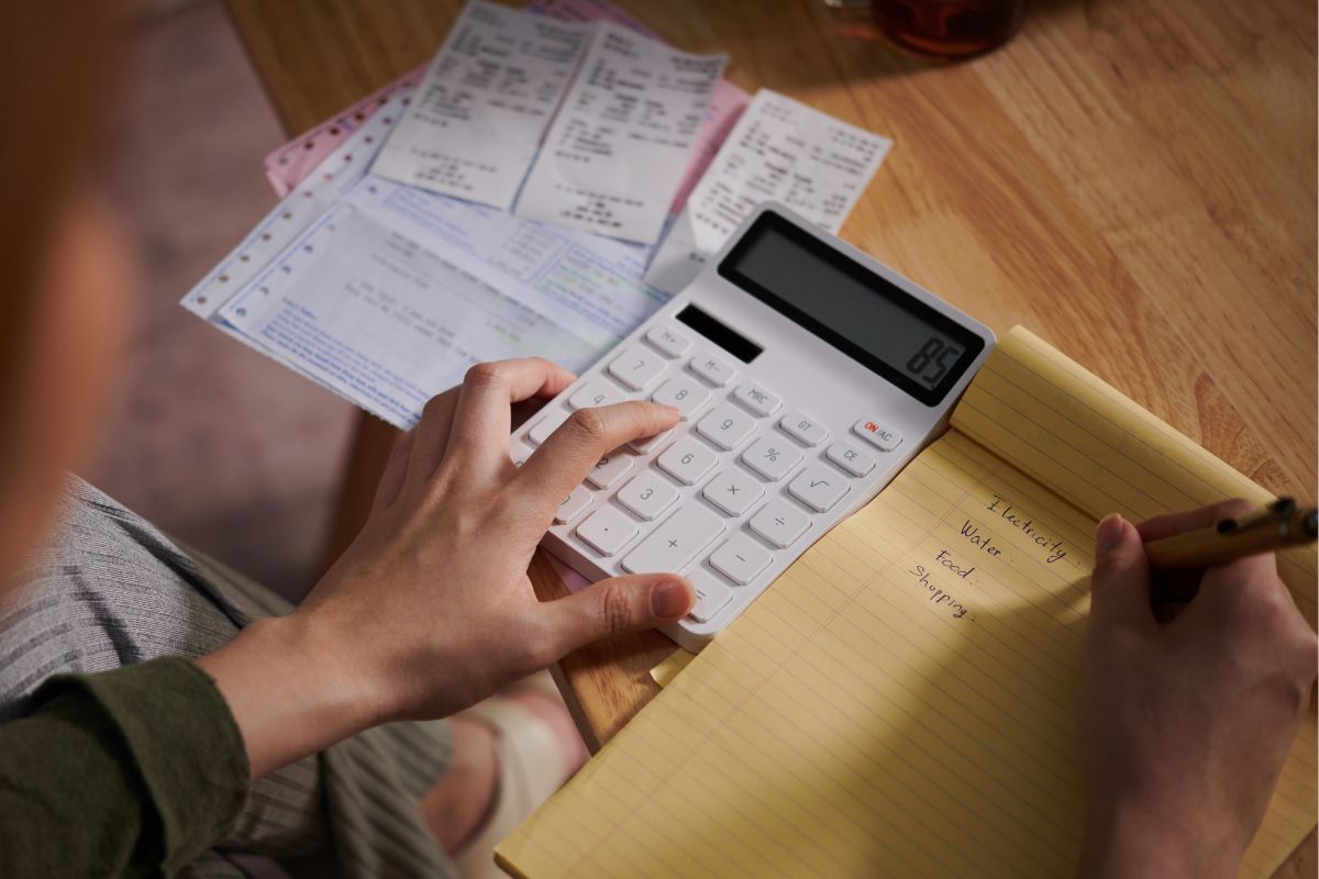 Image of a woman cutting spending.