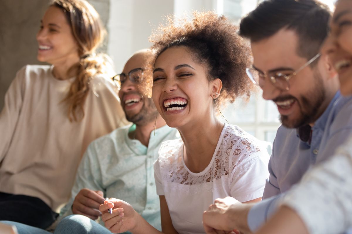 The photo shows a group of friends bonding together.