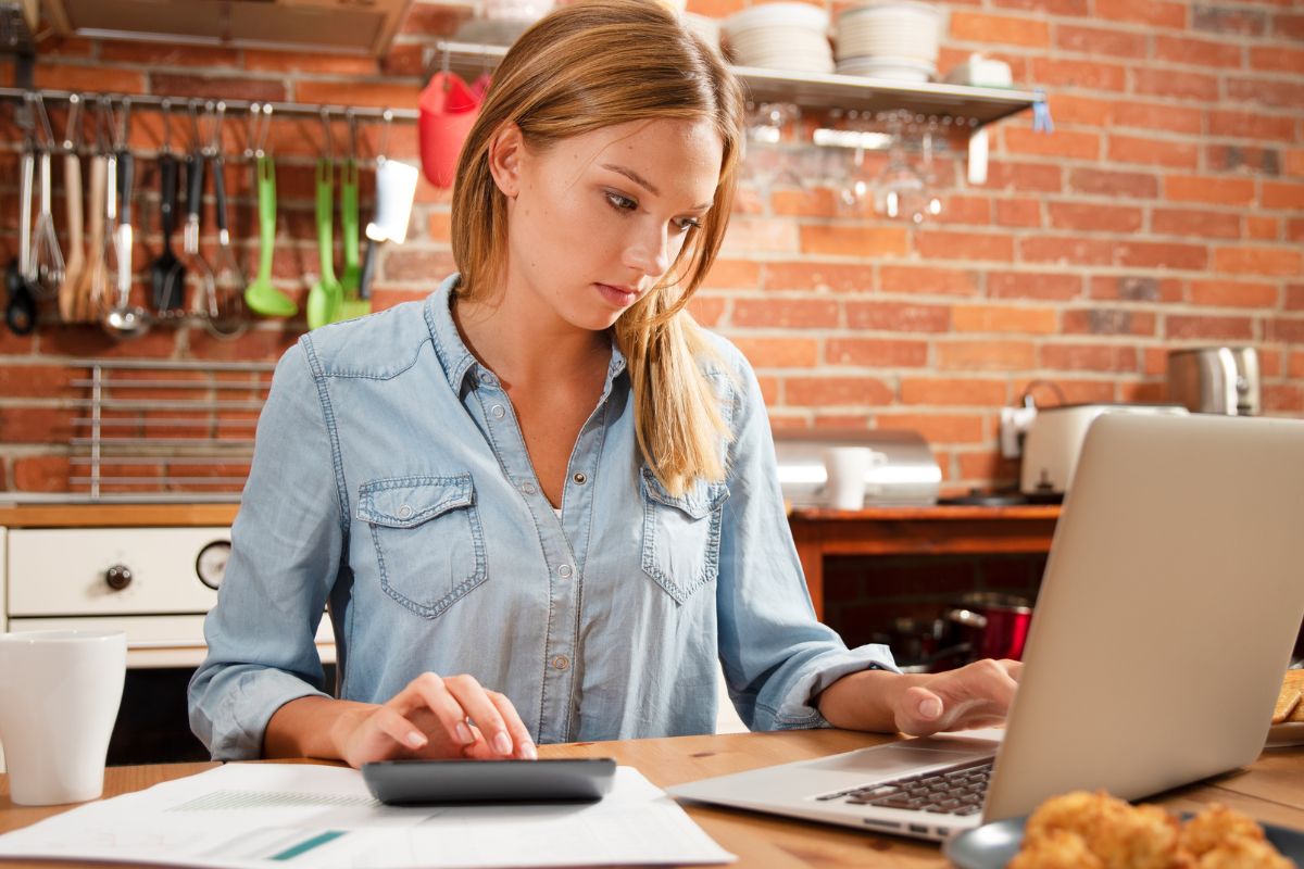 Photo of a woman who uses a bare budget.