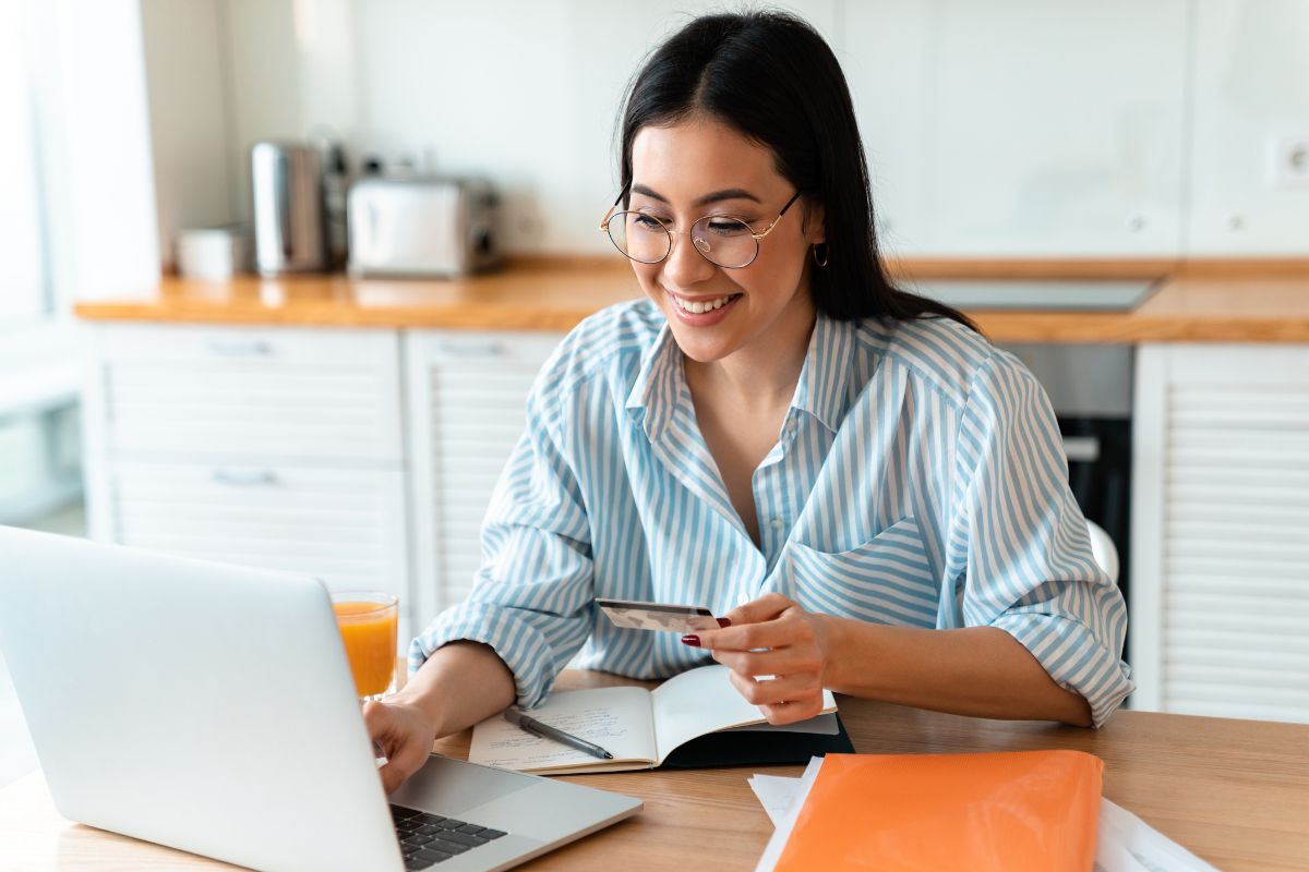 Image of a woman using a credit-builder loan.