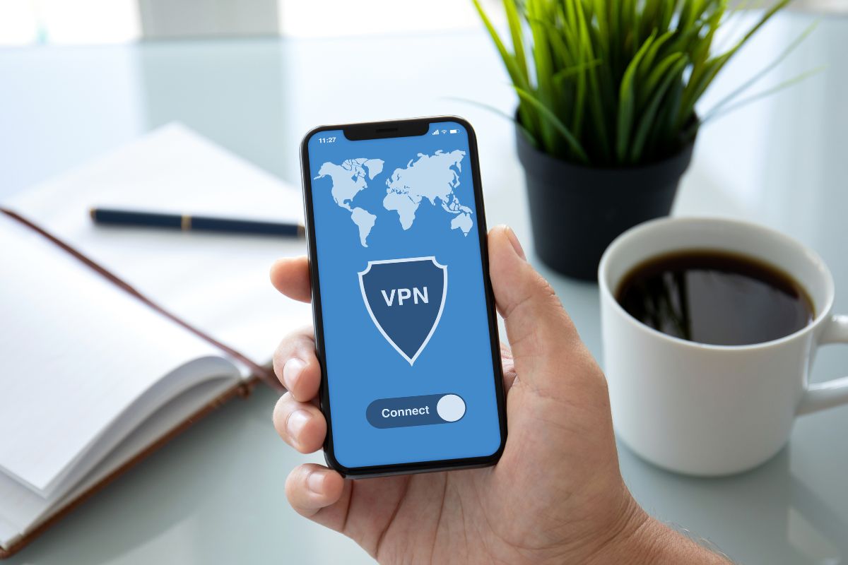 A man's hand using a VPN.