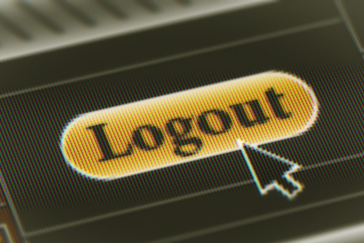 Photo of a logout icon on the screen.