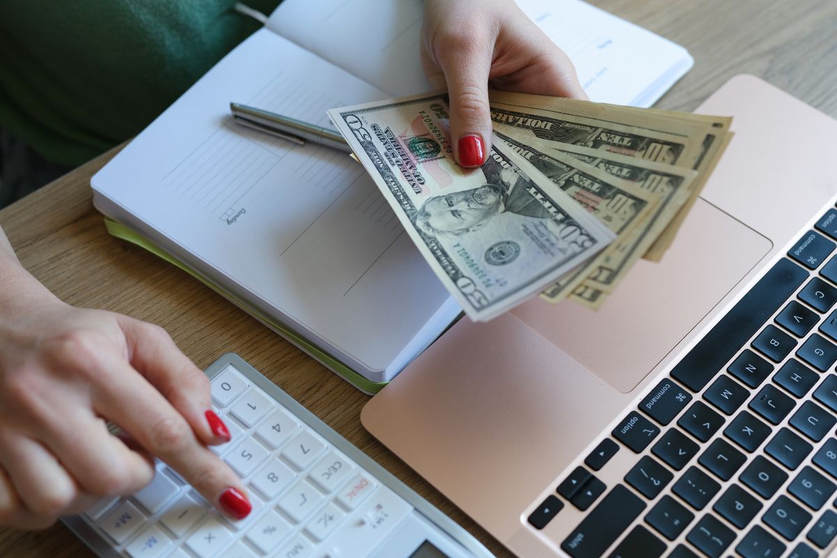 Picture f a woman's hand tracking her progress.