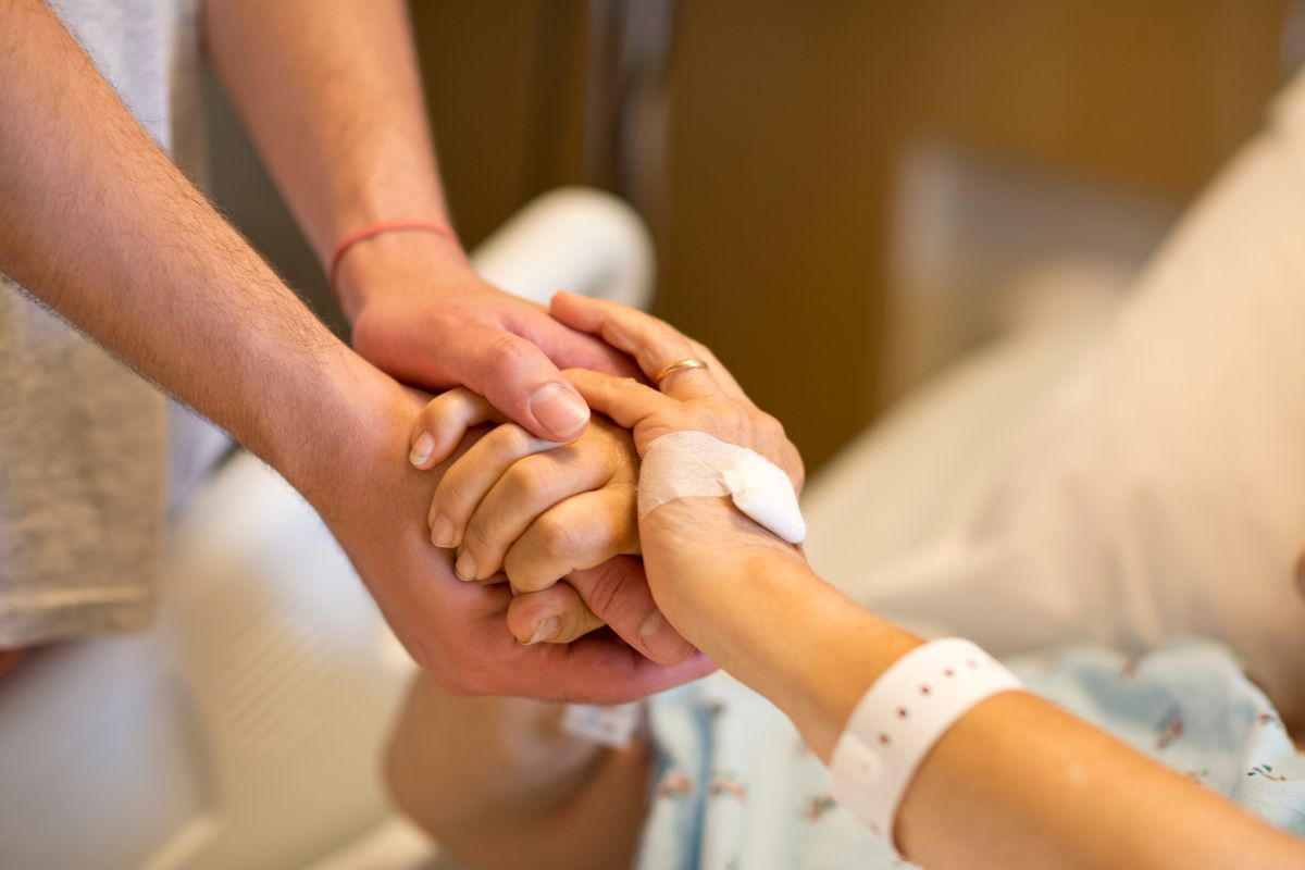 A photo shows a care for a patient.