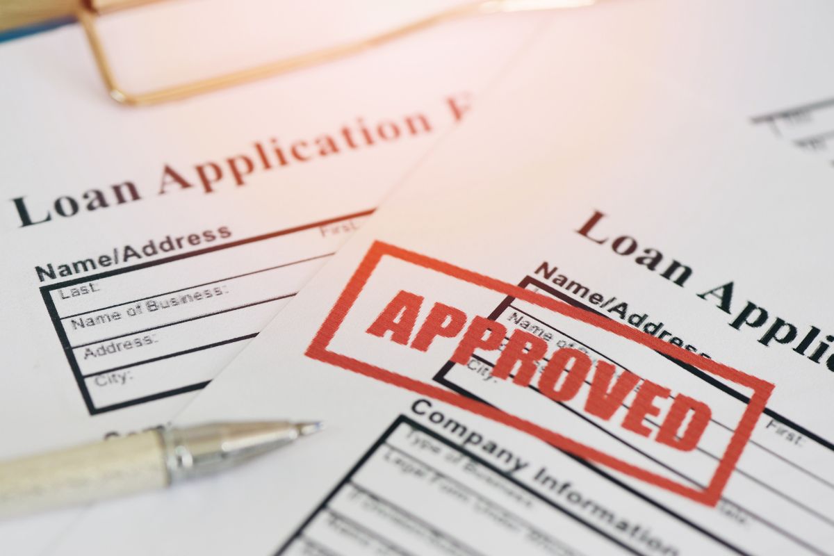 The picture shows an approved loan application form.