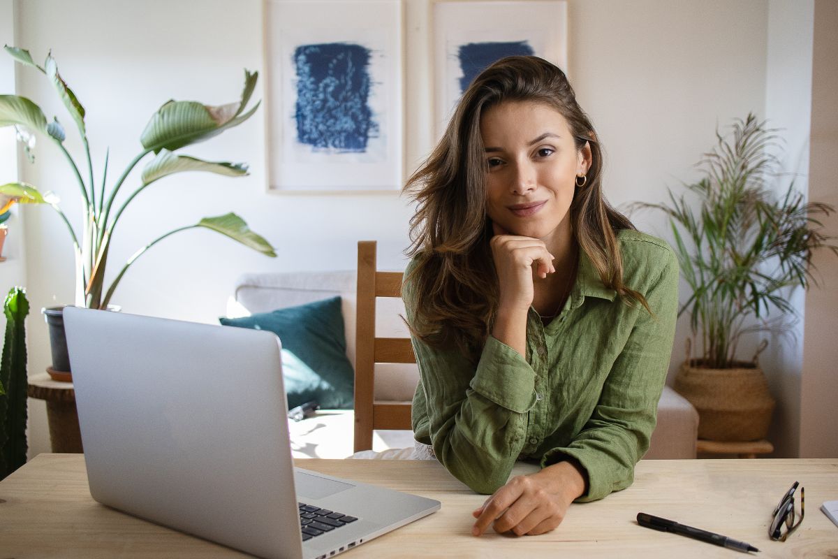 Picture of a woman working from home.