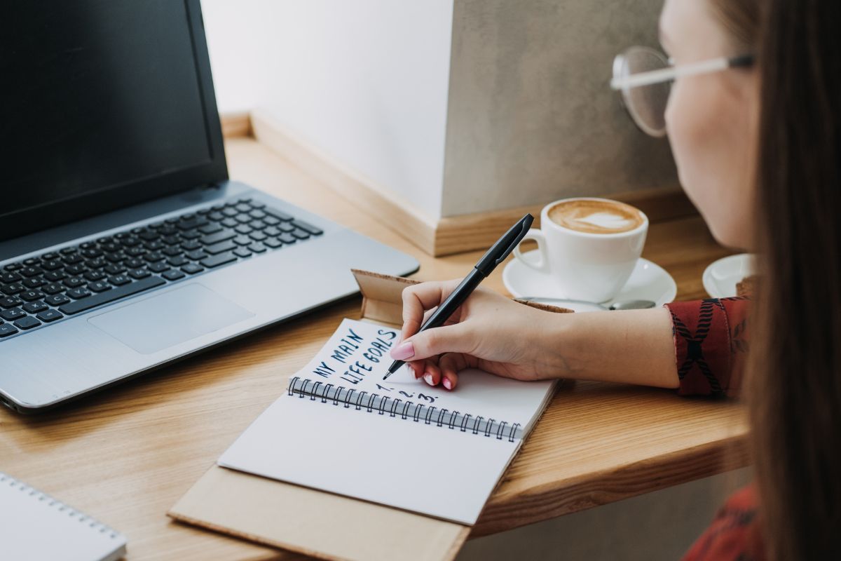 Picture of a woman setting her goals.
