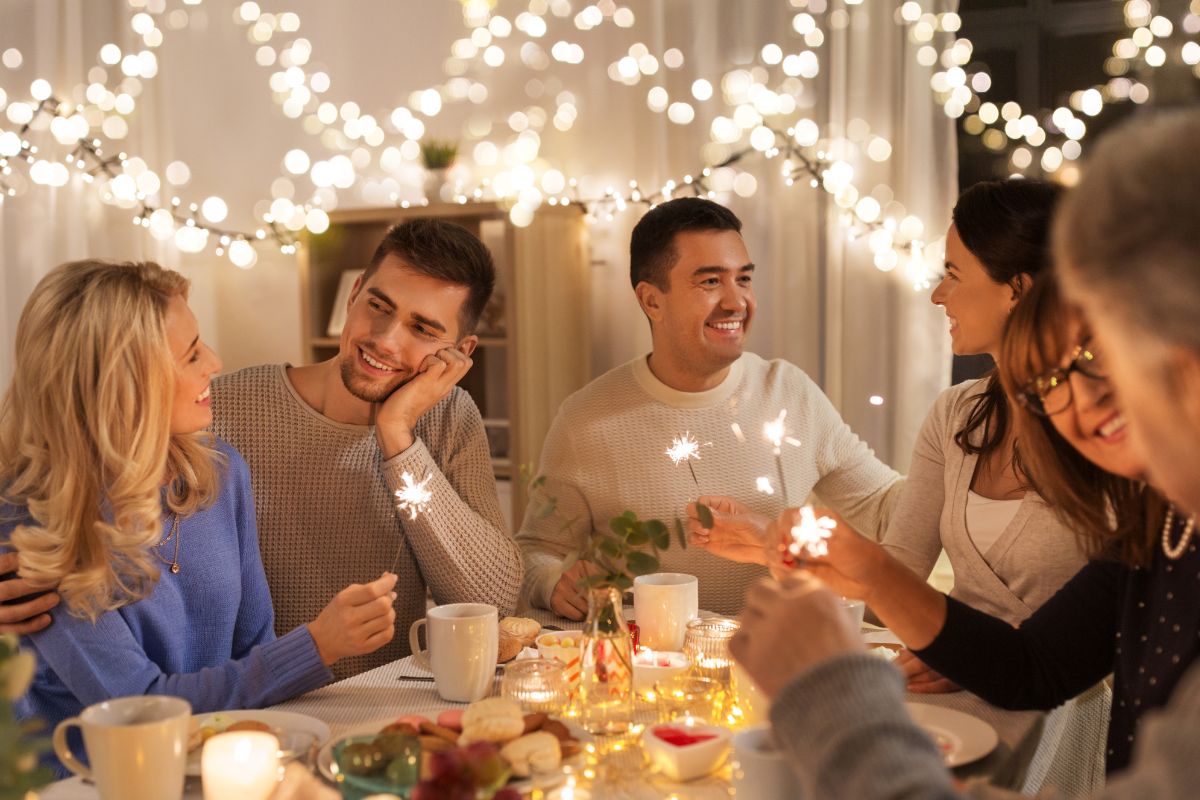 The image shows a family eating dinner together.