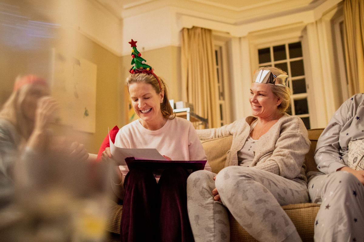 The picture shows a family enjoying Christmas.