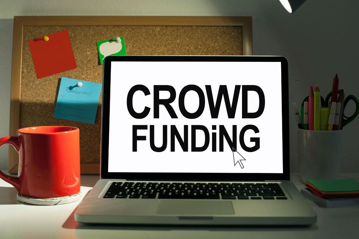 Photo of a laptop with crowd funding screen display.