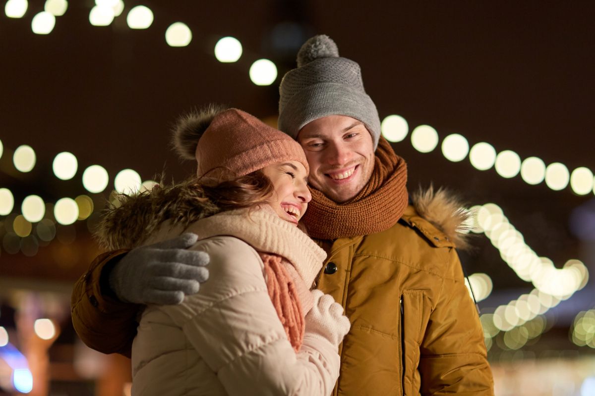 The image shows a couple enjoying their moment together.