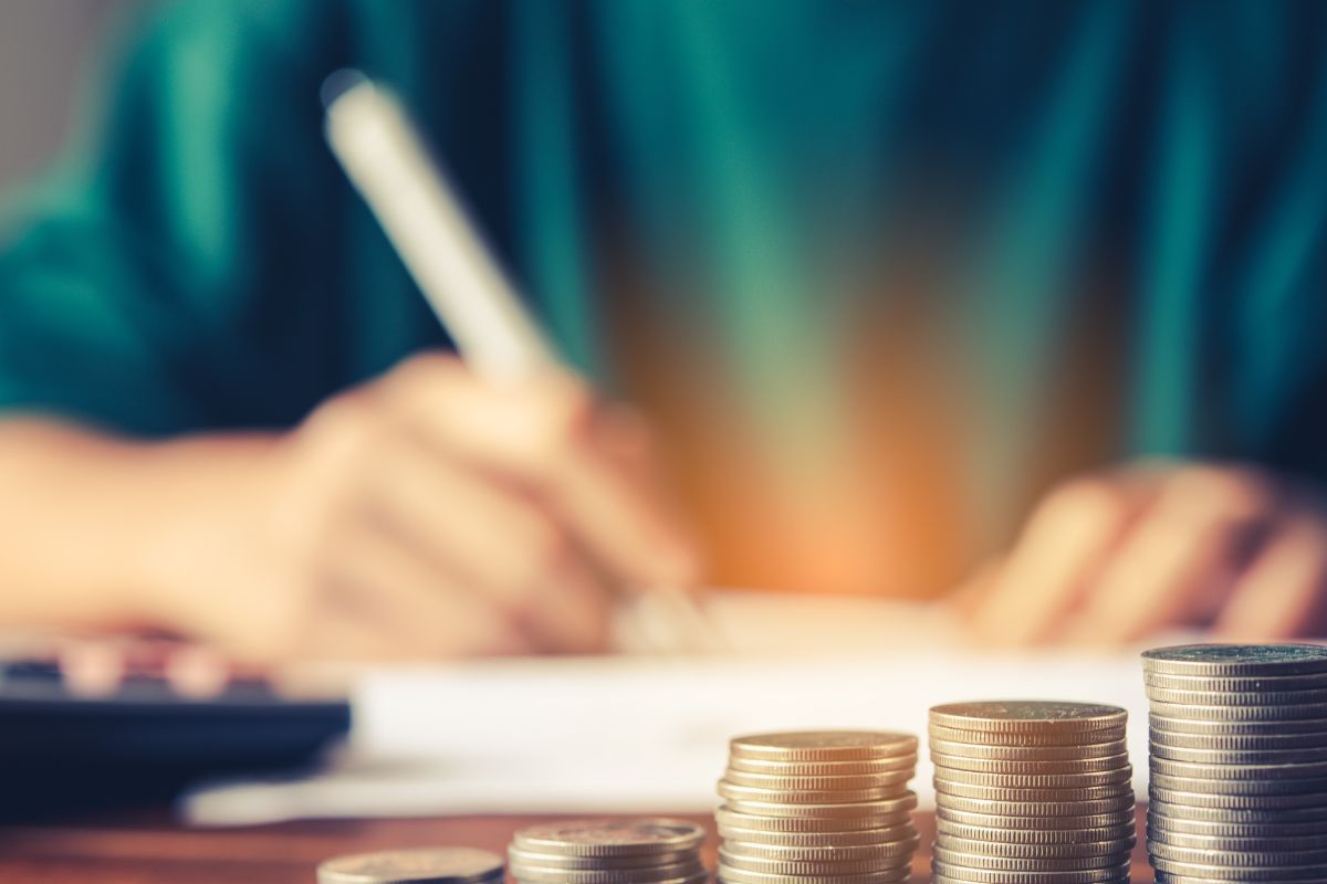A woman determining her spending.