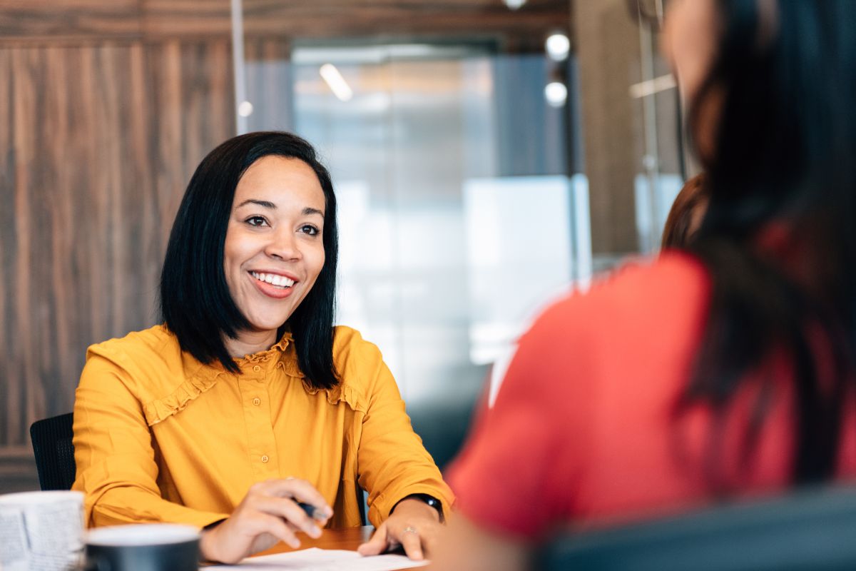 The image shows a woman seeking professional advice.