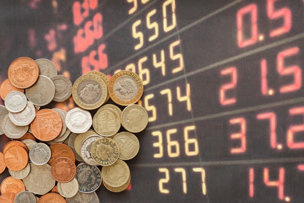 The photo shows coins and numbers on the board.