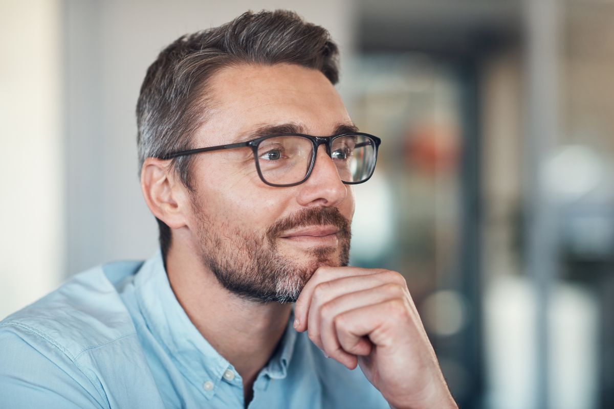 The image shows a man thinking.