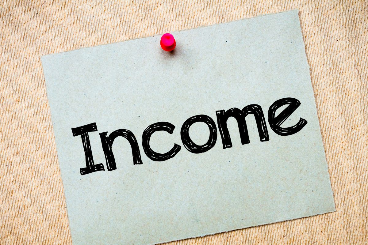 Photo of a paper with income wording.
