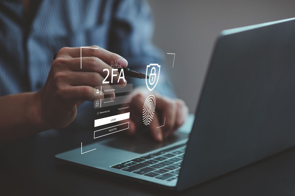 A man's hand protecting an account.