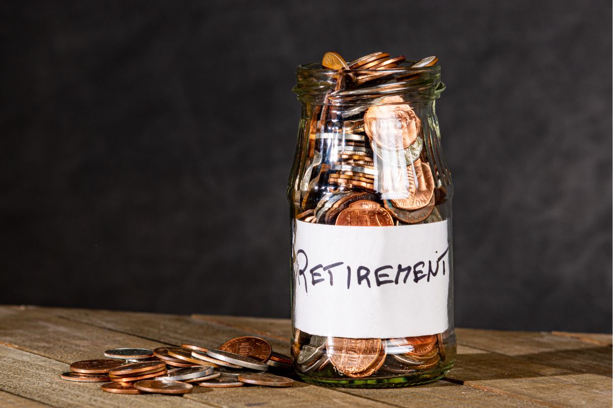 Photo of a jar with retirement savings.