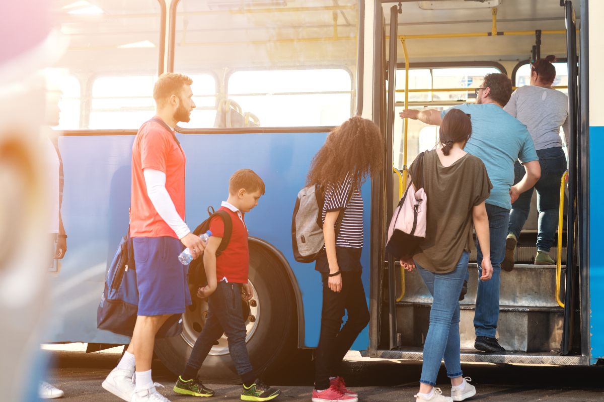 Photo of passengers getting into the bus.