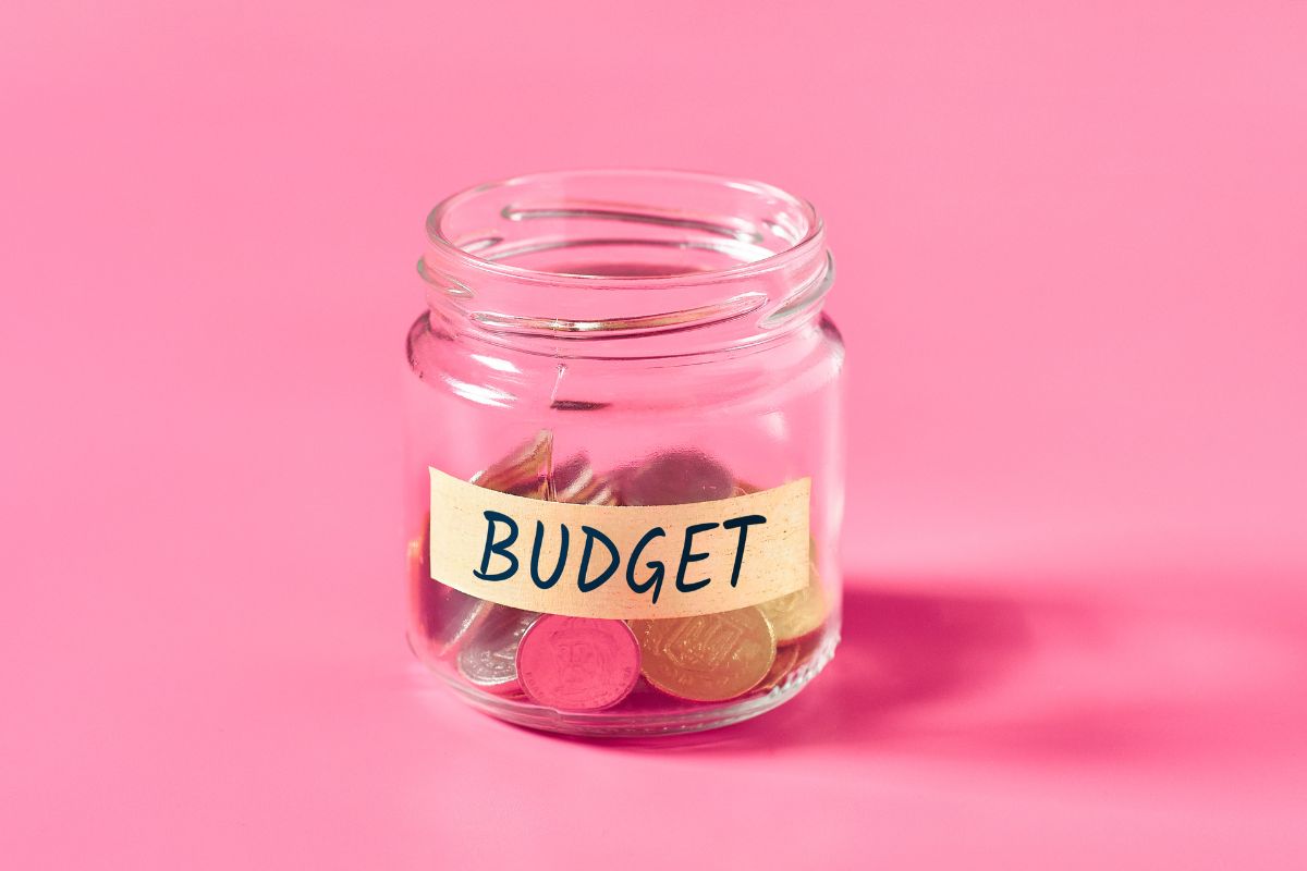 Picture of a jar with a budget label.