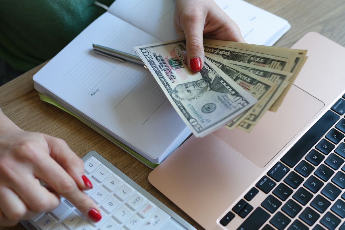 Image of a woman's hand budgeting.