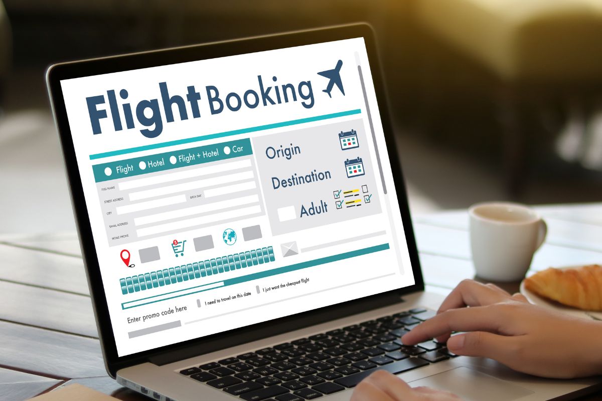 Photo of a woman booking a flight.