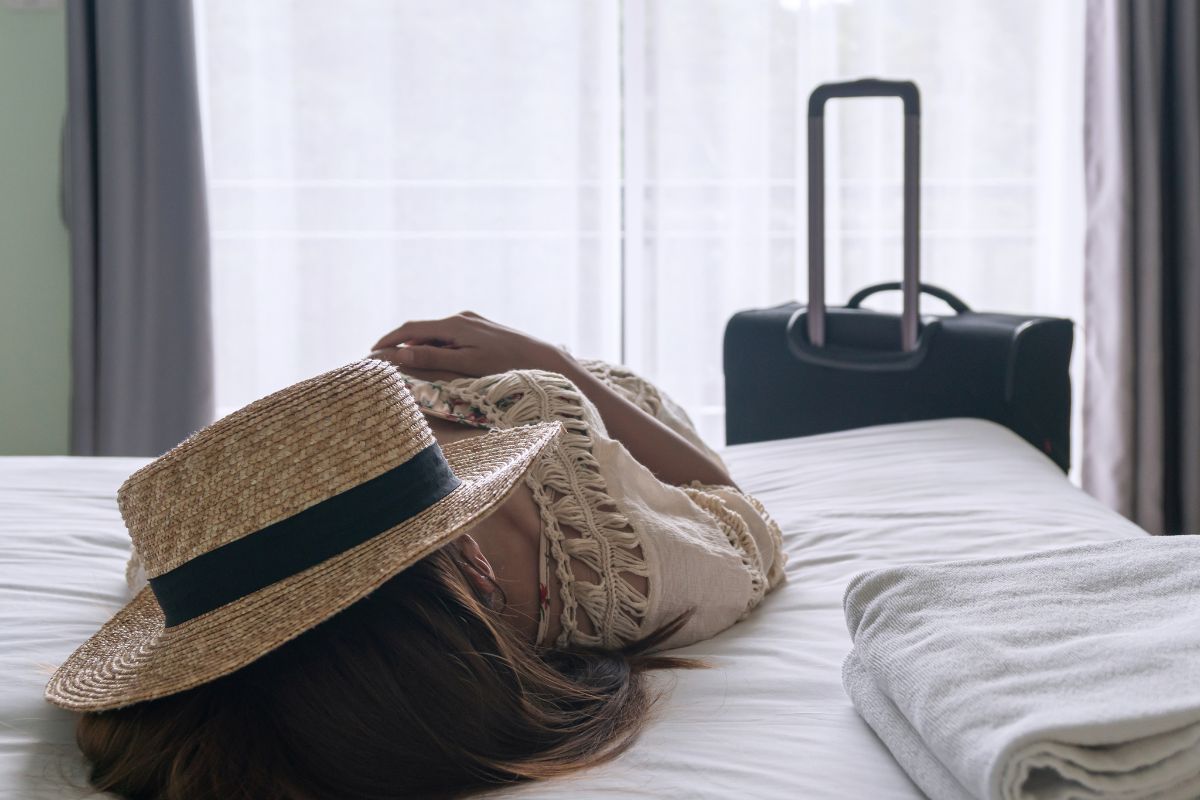 Picture of a woman resting at the hotel.
