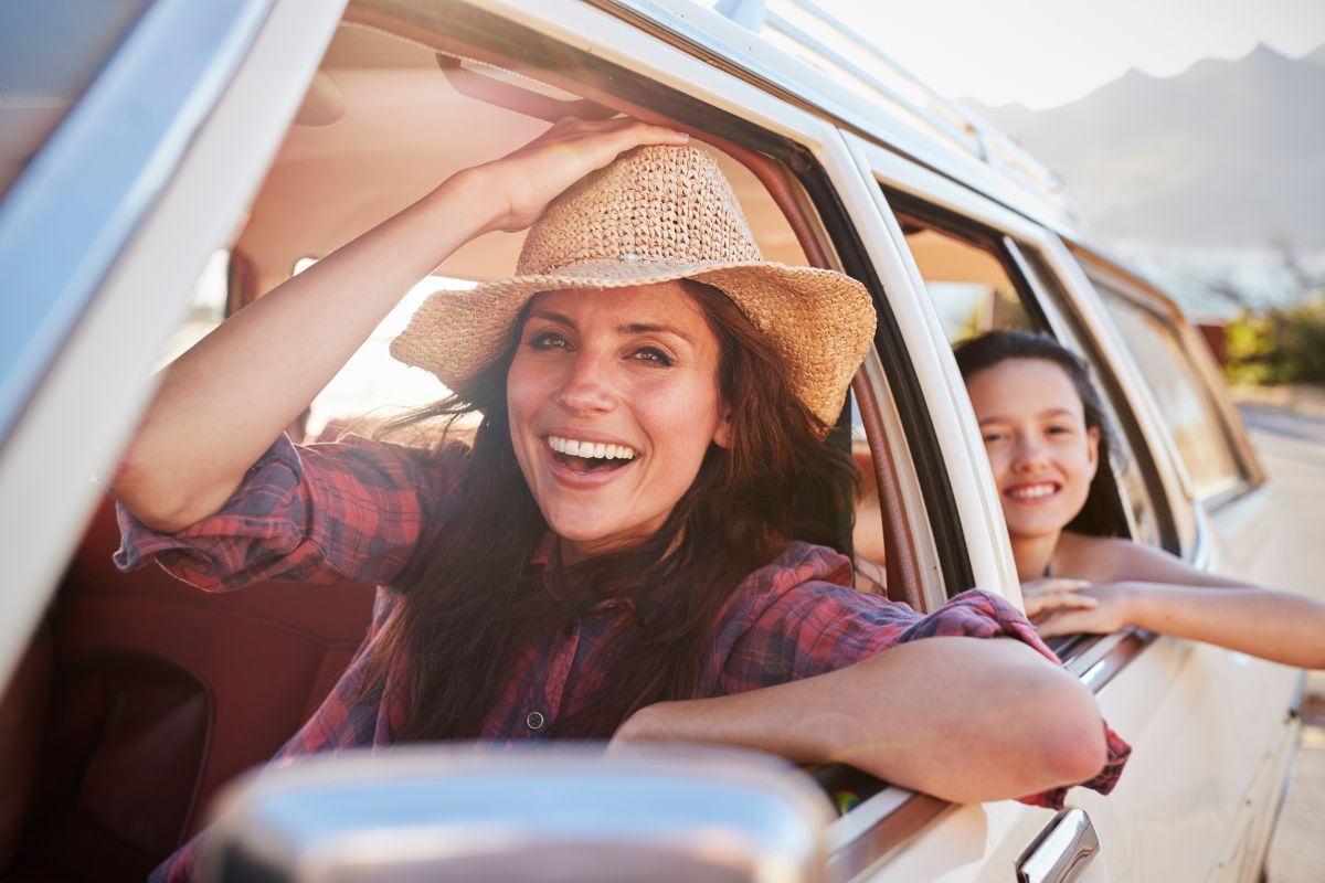 Image of a mother and daughter on a road trip.