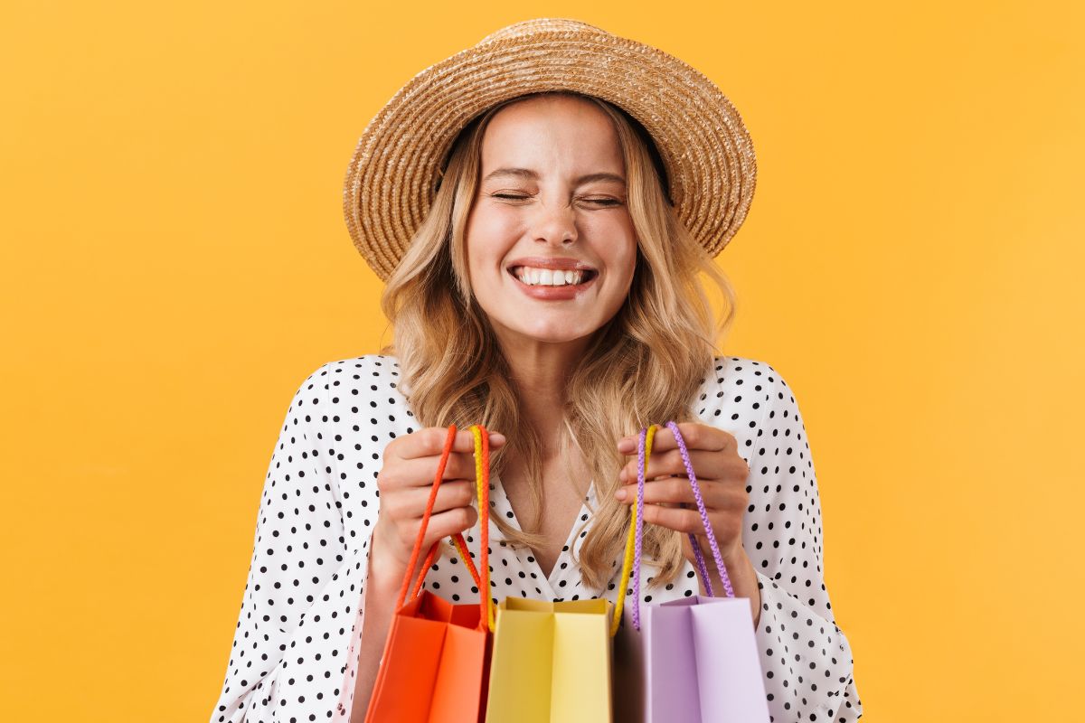 Image of a woman holding shopping bags.