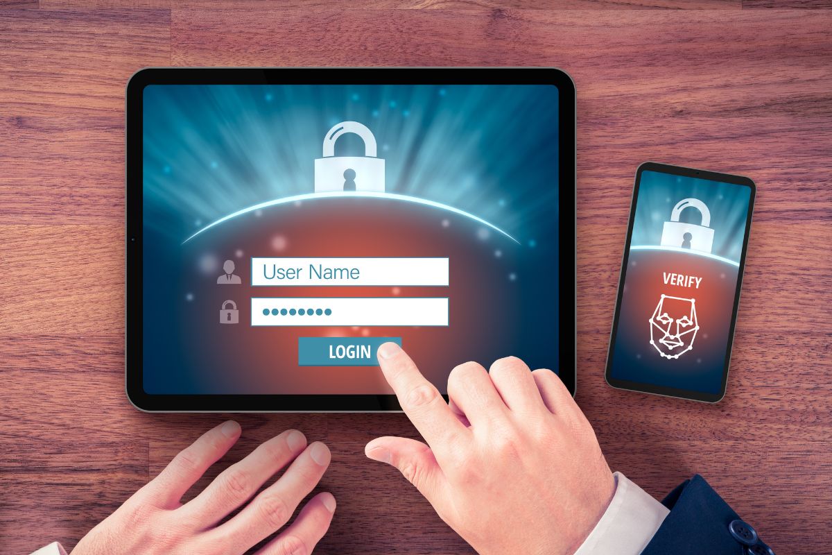 A man's hand logging in his account.