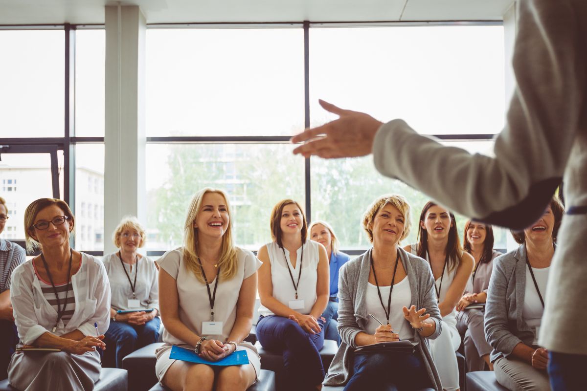 Picture of people attending a seminar.