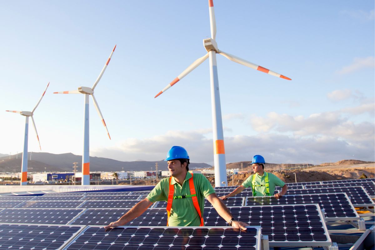 The picture shows men working in an energy company.